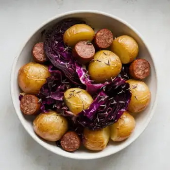 Sausage Bake with Crunchy Potatoes, Red Cabbage, and Caraway