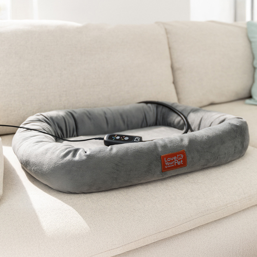 Katze im Regal-Wärmebett