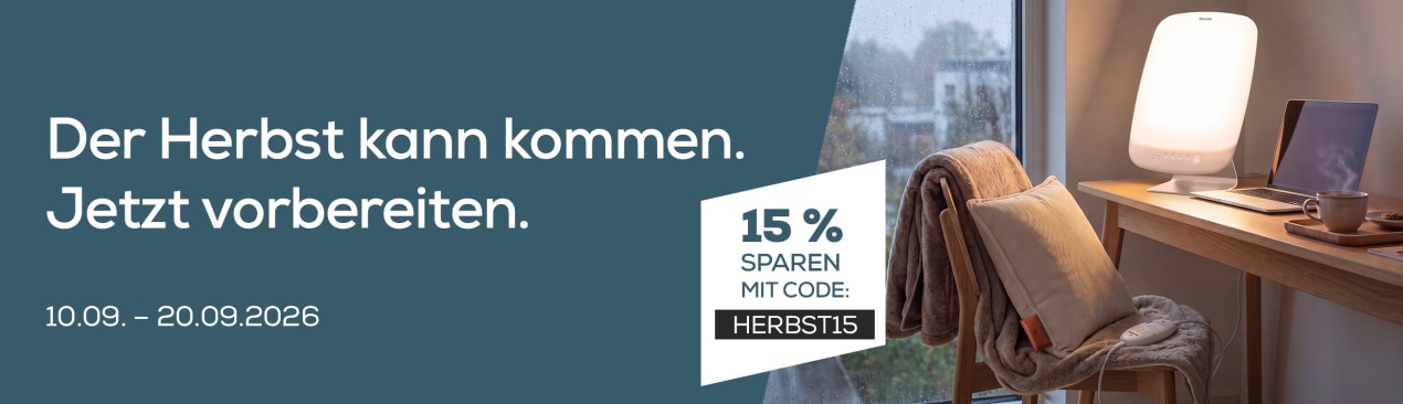 Verschiedene Beurer Produkte wie HK 77 und TL 95 sind an einem Schreibtisch zu sehen