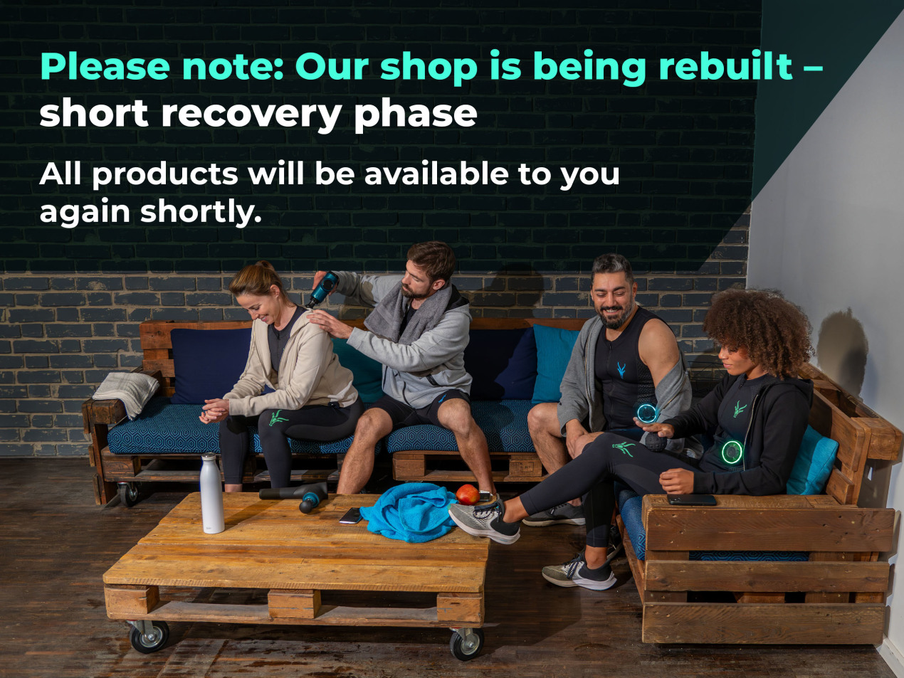 Banner: Four friends are relaxing after playing sports. The banner reads: Please note: Our shop is being rebuilt – short recovery phase, all products will be available to you again shortly.