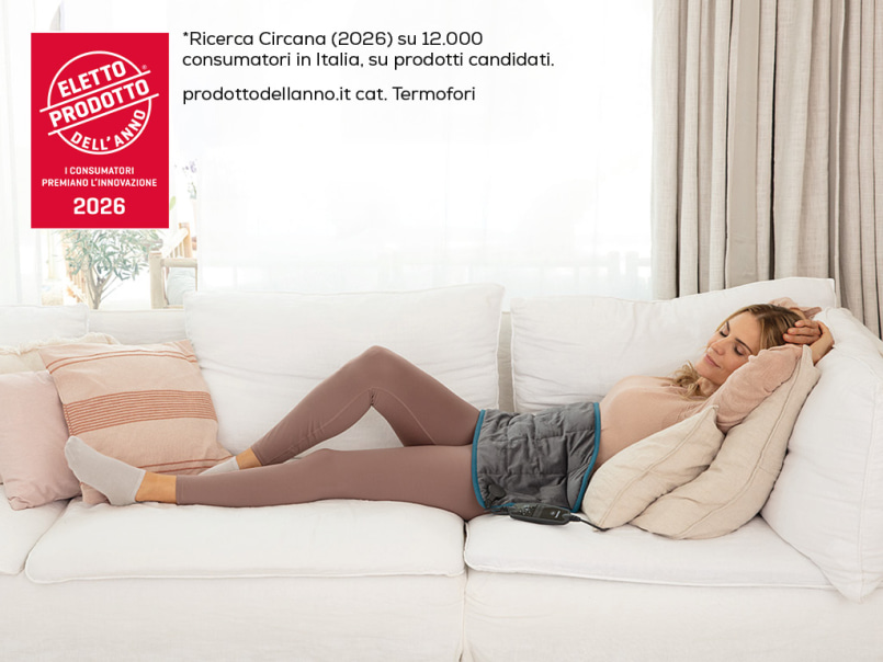 Donna sul divano con termoforo HK 145