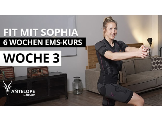 Fitness trainer Sophia does a plank in the EMS suit from Antelope.