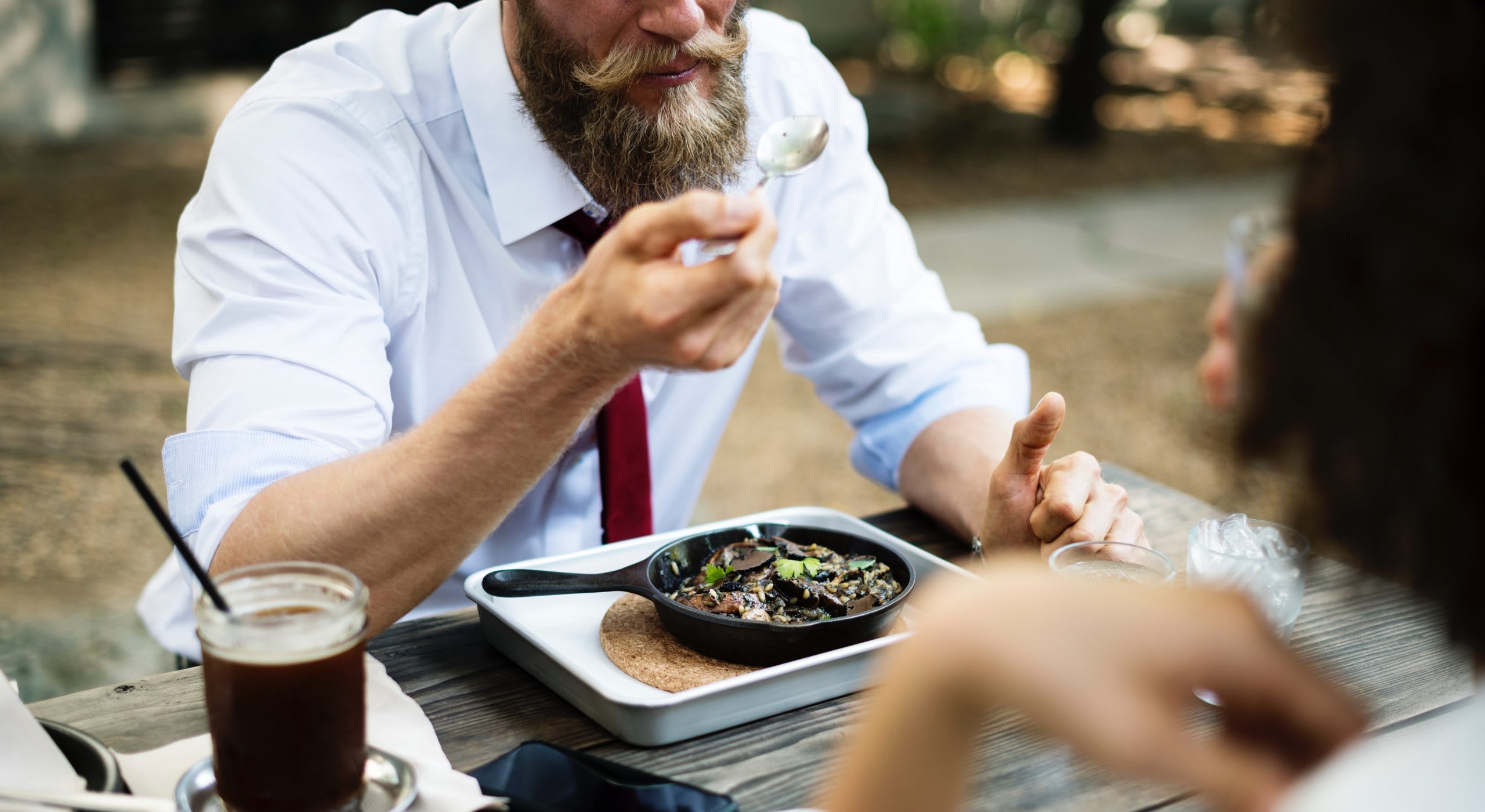 Man eating dinner and explaining why his moustache was worth being disinherited Man eating dinner and explaining why his moustache was worth being disinherited