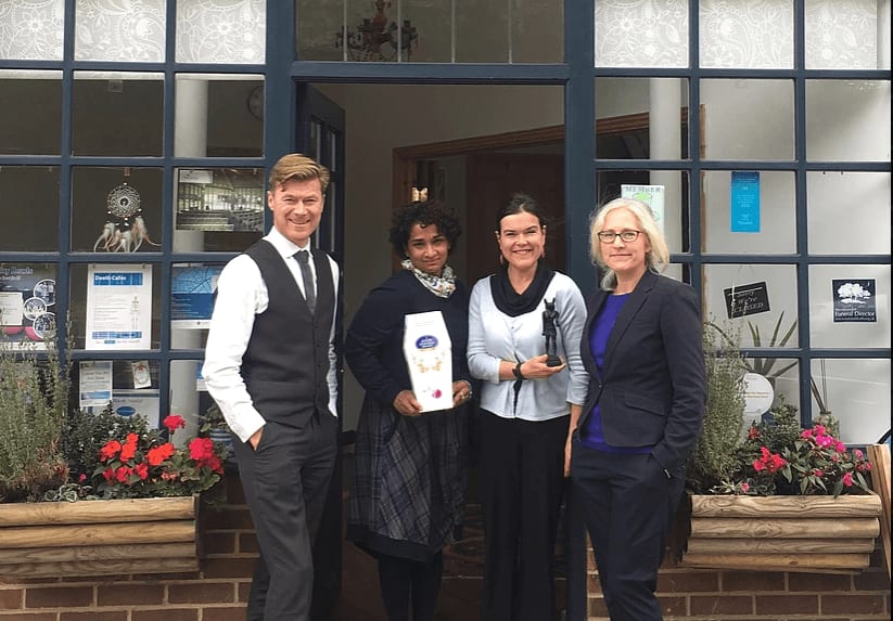 The team from Compassionate Funerals stand in front of their funeral home