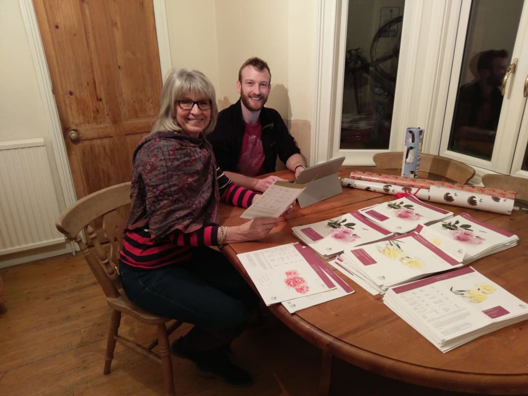 James Dunn and his mum collating Dignity's prices over Christmas