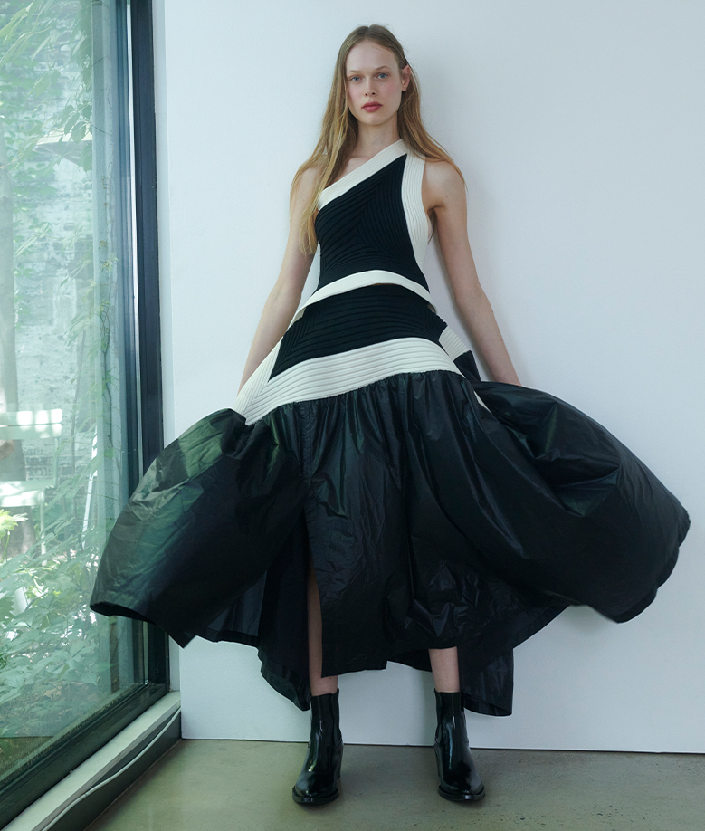 Model Wears Issey Miyake - Square Scheme 2 Stripe Knit Structured Skirt
