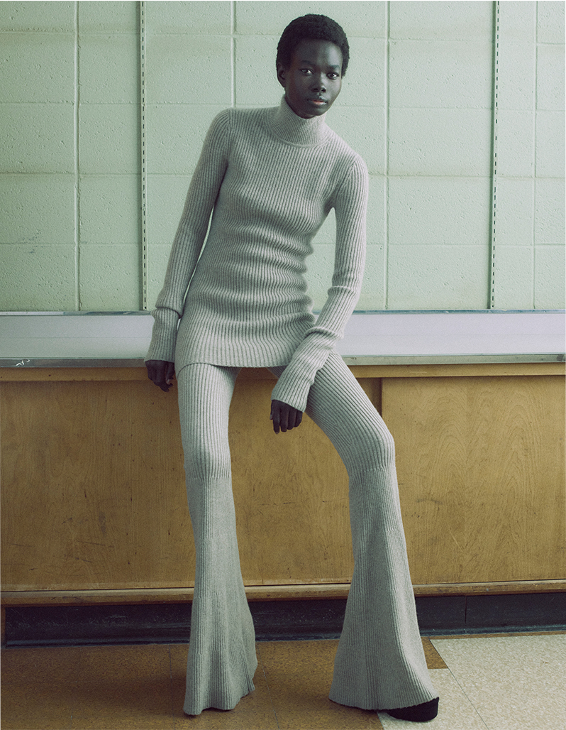 Model Wears Michael Kors Collection - Ribbed Turtleneck Cashmere Tunic and Ribbed Cashmere Flared Pants
