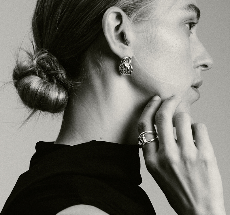 Model wears Lié Studio jewelry
