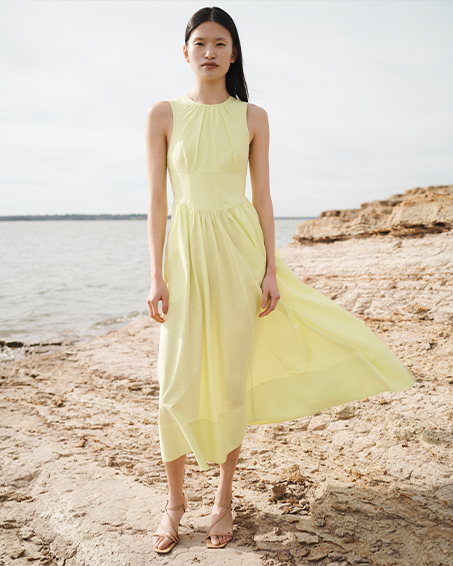 Model Wears Cinq  Sept - Benita Tie-Back Sleeveless Midi Dress