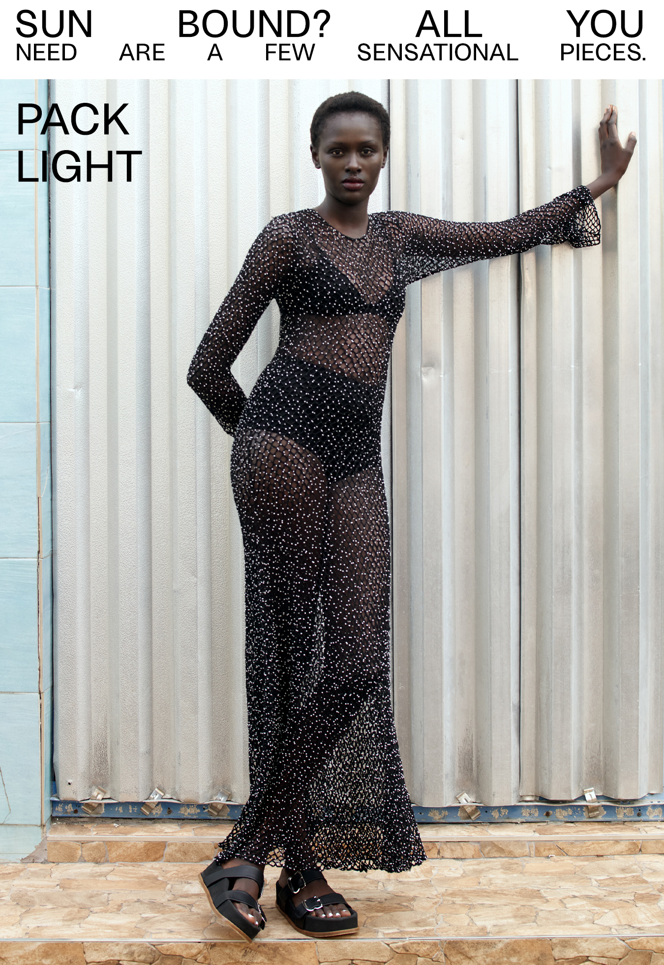 Model wears Gabriela Hearst - Xavier Open-Knit Cashmere Dress with Glass Bead Detail