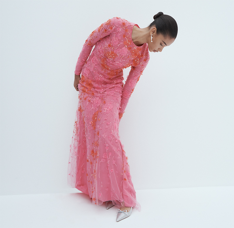 Model wears Monique Lhuillier Embroidered Floral Evening Gown