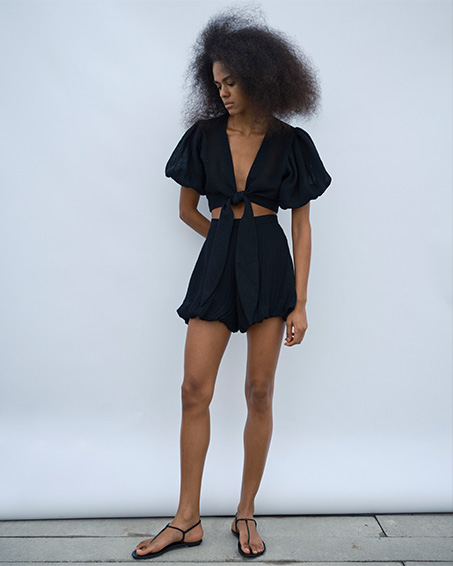 Model wears Lisa Marie Fernandez set