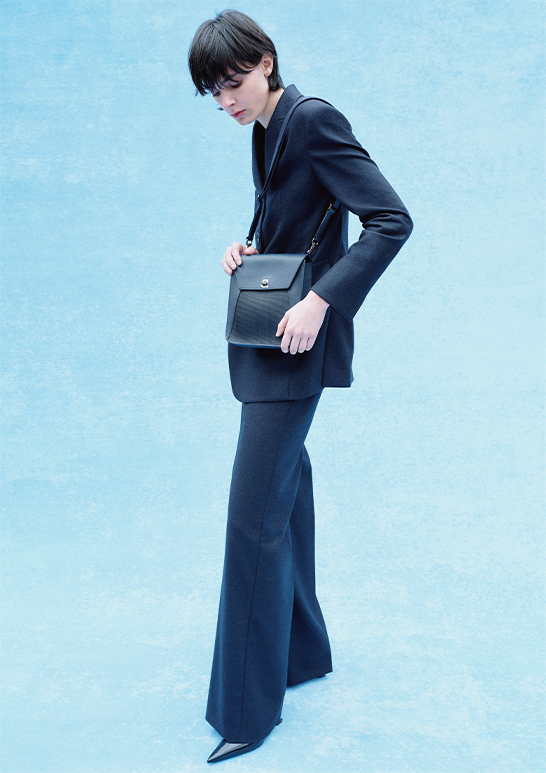 Model Wears Akris - Tyson Prince of Wales Wool Jacket, Navy and Floretta Prince of Wales Wide Leg Wool Trousers