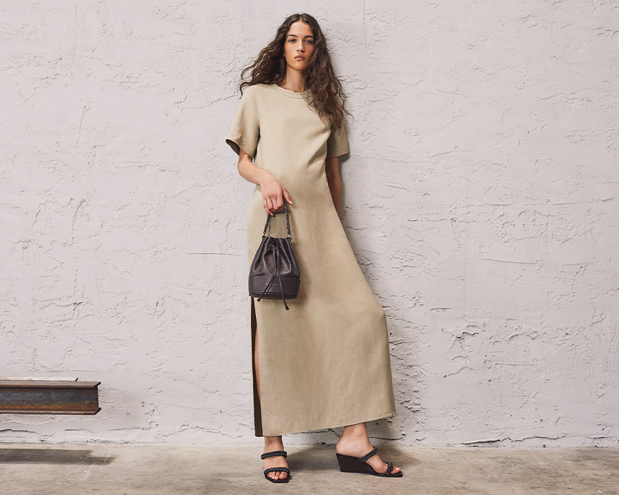 Model Wears Brunello Cucinelli - Fluid Linen Twill T-Shirt Dress with Slits and Monili Detail