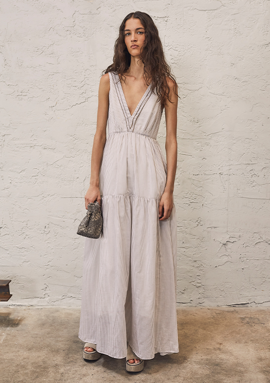 Model Wears Brunello Cucinelli - Cotton Silk Striped Maxi Dress with Ruffled Waist and Monili Detail