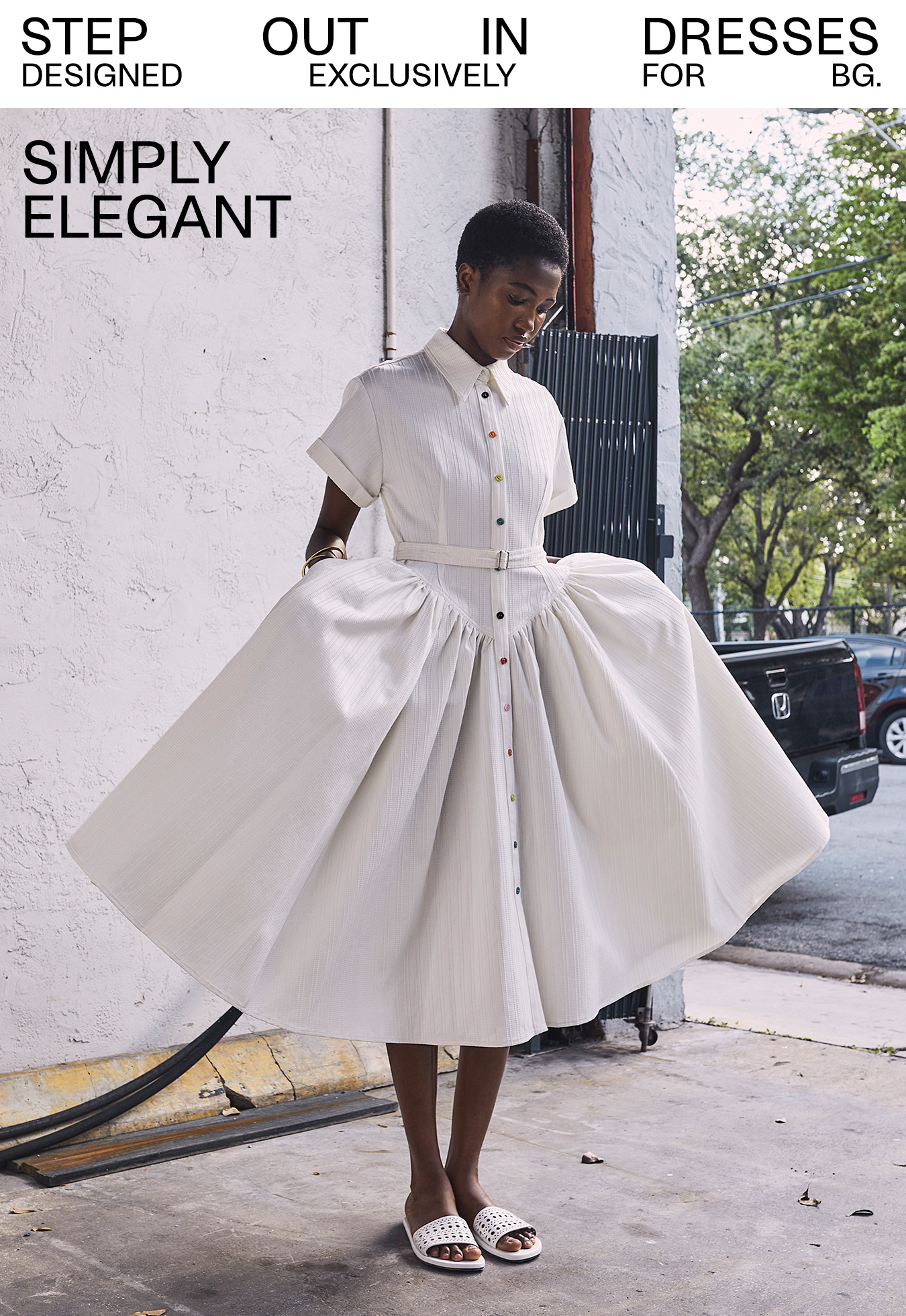 Simply Elegant - Step out in dresses designed exclusively for BG.; Model in image wears Christopher John Roogers - Embroidered Smart Belted Shirtdress