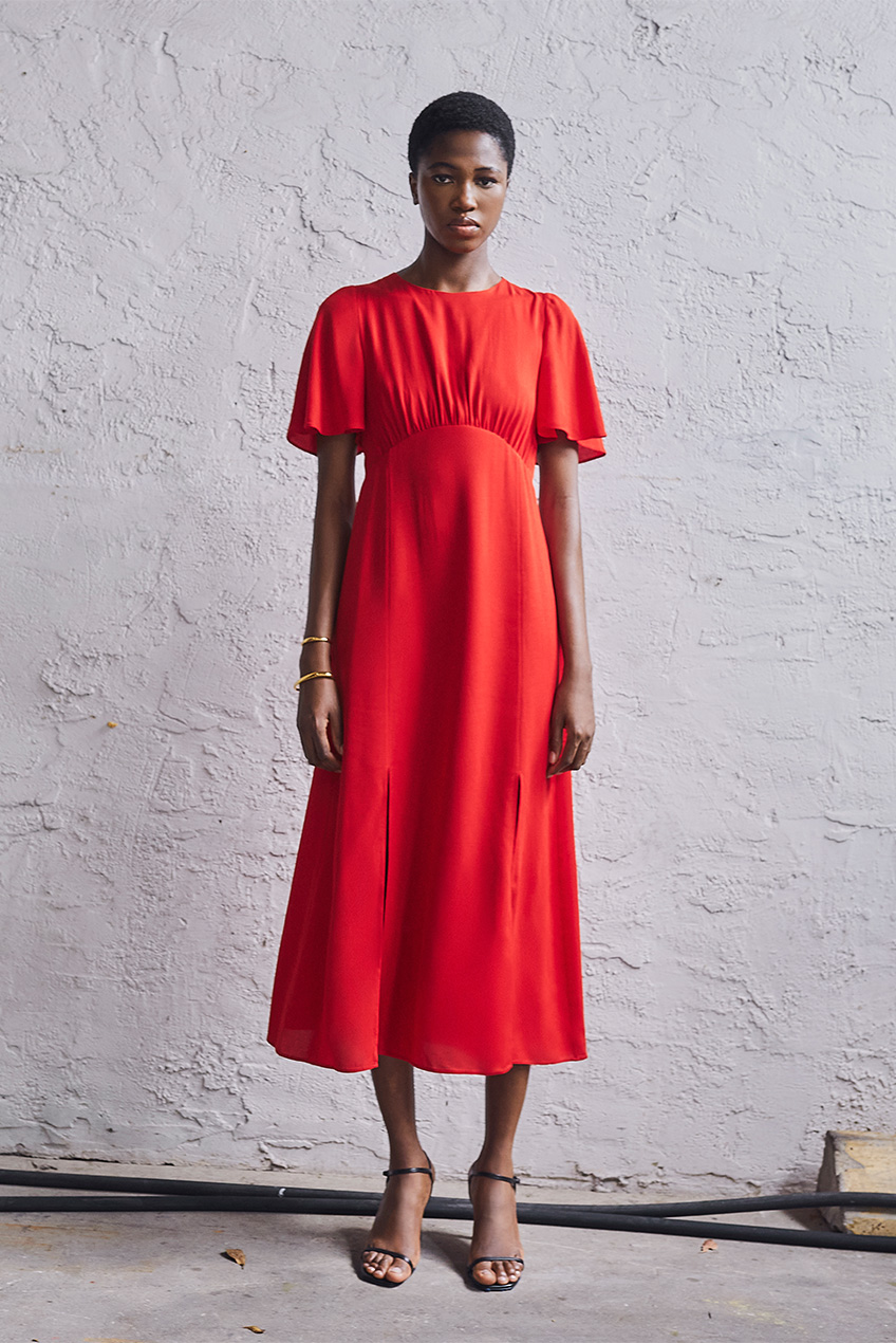 Model wear Akris Punto - Moss Crepe Midi Dress with Half Circle Waistline in red