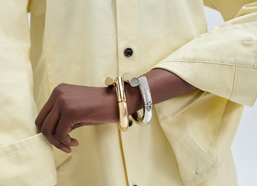 Model wears Tabayer - Oera 18K Gold and White Gold Diamond Pav Bracelet