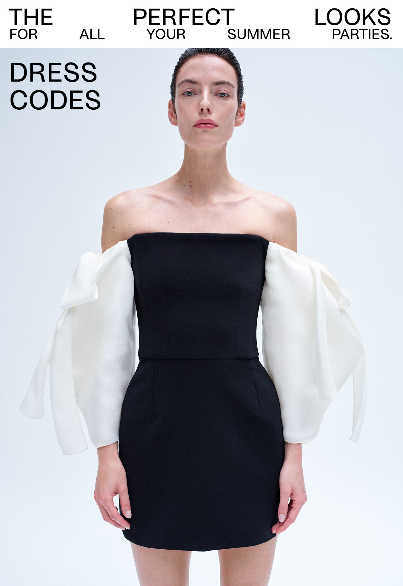 Dress Codes - The perfect looks for all your summer parties.; Model wears Carolina Herrera - Off-Shoulder Mini Dress with Draped Bow Sleeves