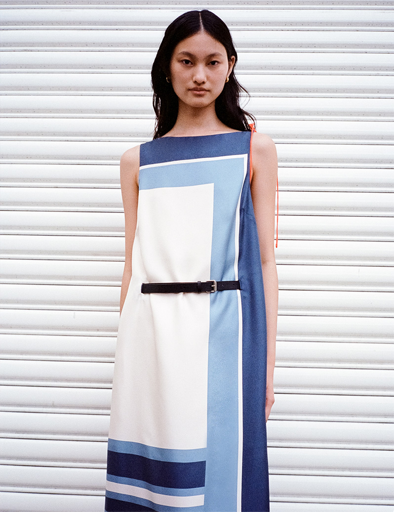 Model wears SIR - Dazed Belted Midi Dress