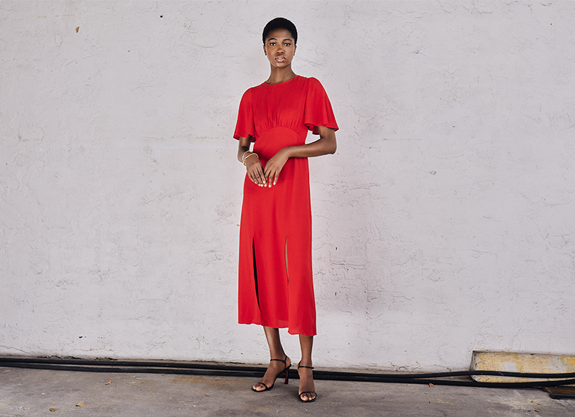 Model wears Akris punto - Dot cut-out empire dress in crepe