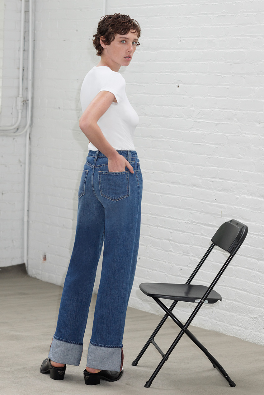 Model wears L'Agence - Miley Ultra High Rise Wide-Leg Cuffed Jeans