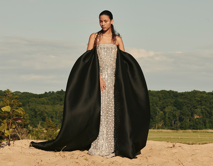 Model wears Pamella Roland - Crystal Embellished Tulle Gown with Pique Mikado Cape