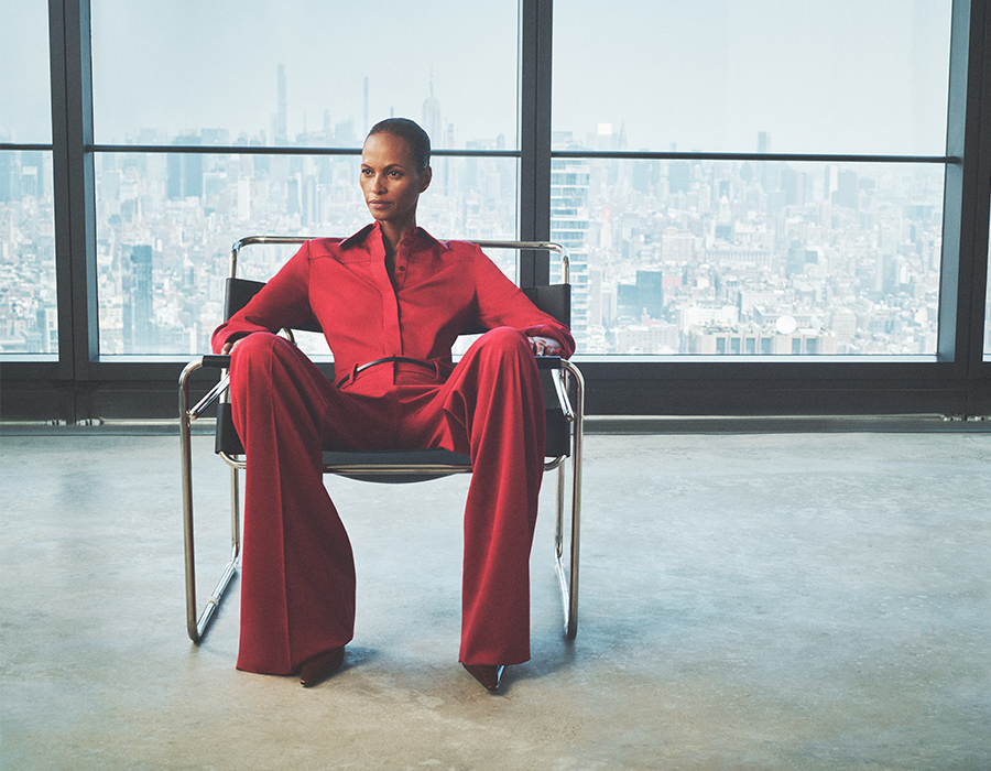 Model wears Another Tomorrow - Bias Seamed Button Up Blouse and Pleated Wide-Leg Suit Pants
