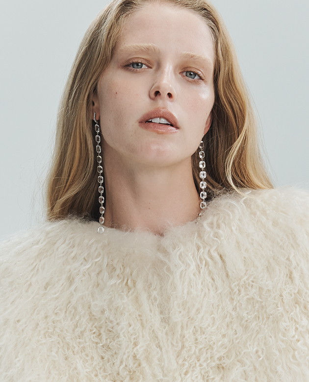 Model wears Sidney Garber earrings
