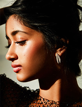 Model wears Kamal - Lotus Diamond Drop Earrings