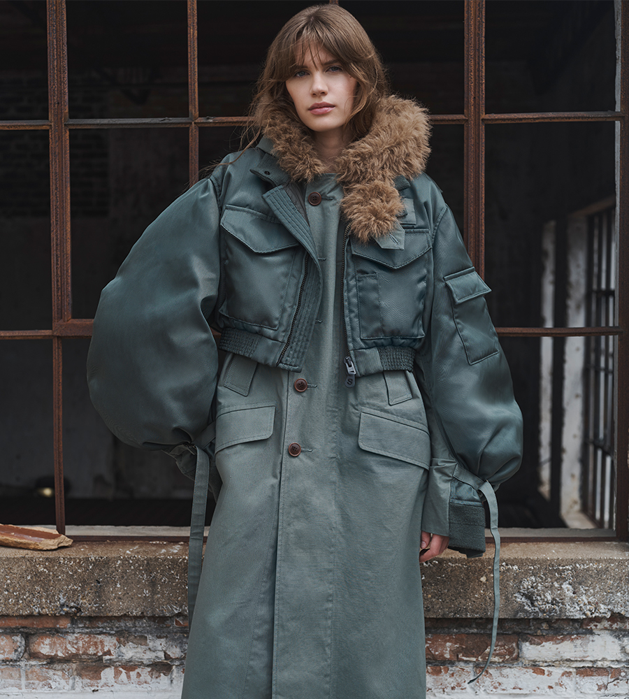 Model wears Sacai - Spiewak Faux Fur Trim Nylon Trench Hybrid Coat