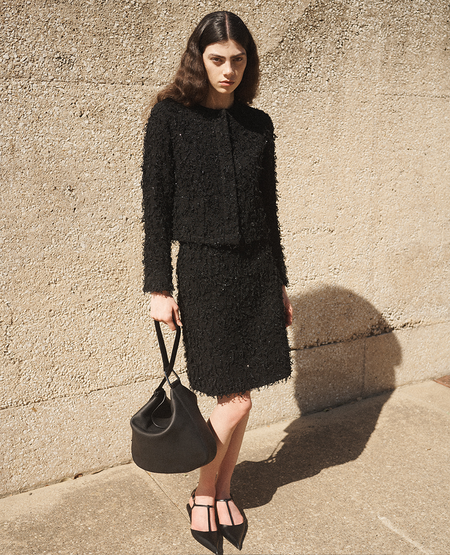 Model wears Akris - Short Sequined Fringe Boucle Skirt