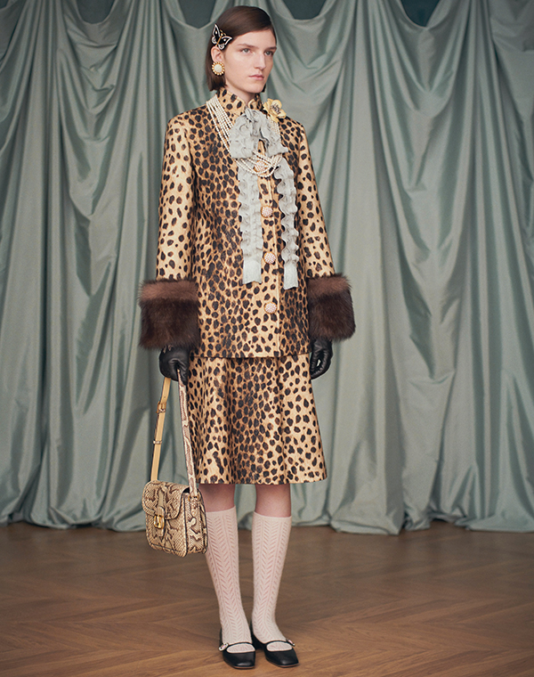 Model wears Valentino Garavani - Leopard Faux Fur Cuff Caban Jacket and Leopard A-Line Wool Skirt