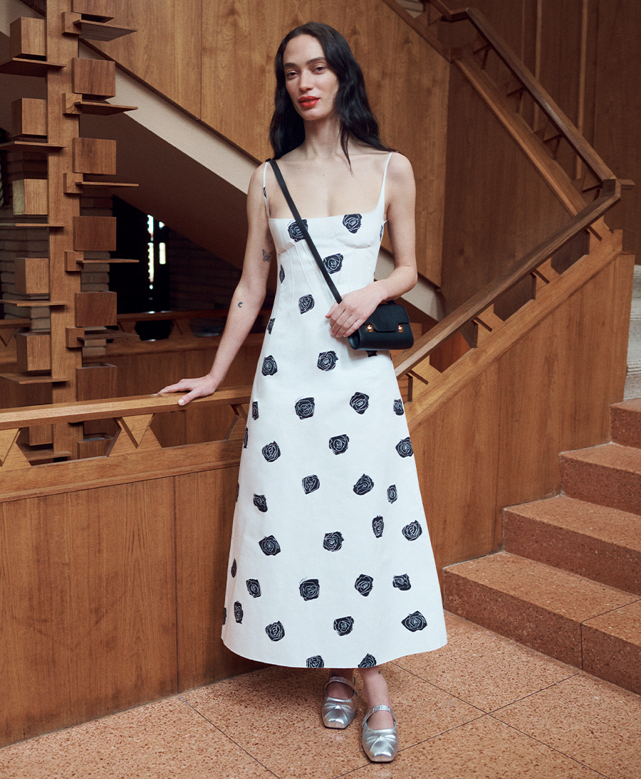 Model wears Marni - Rose-Print Sleeveless Button-Back Ankle Dress