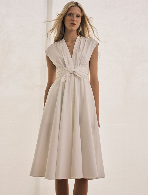 Model wears Kobi Halperin - Kiernan Ruched Cap-Sleeve Midi Dress