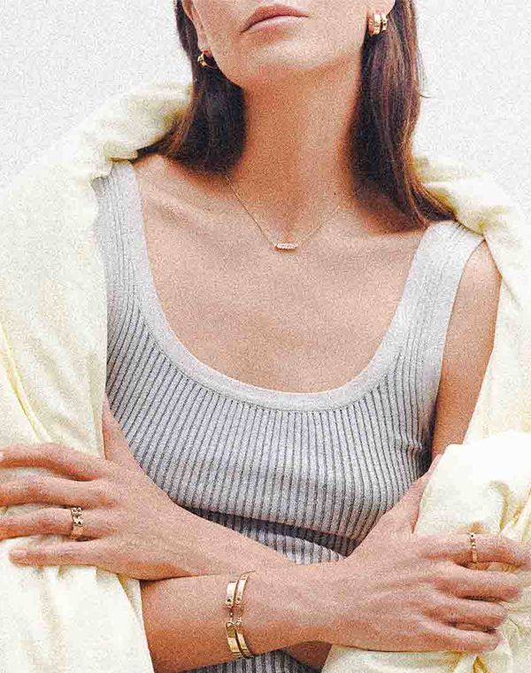 Model wears Nouvel Heritage jewelry
