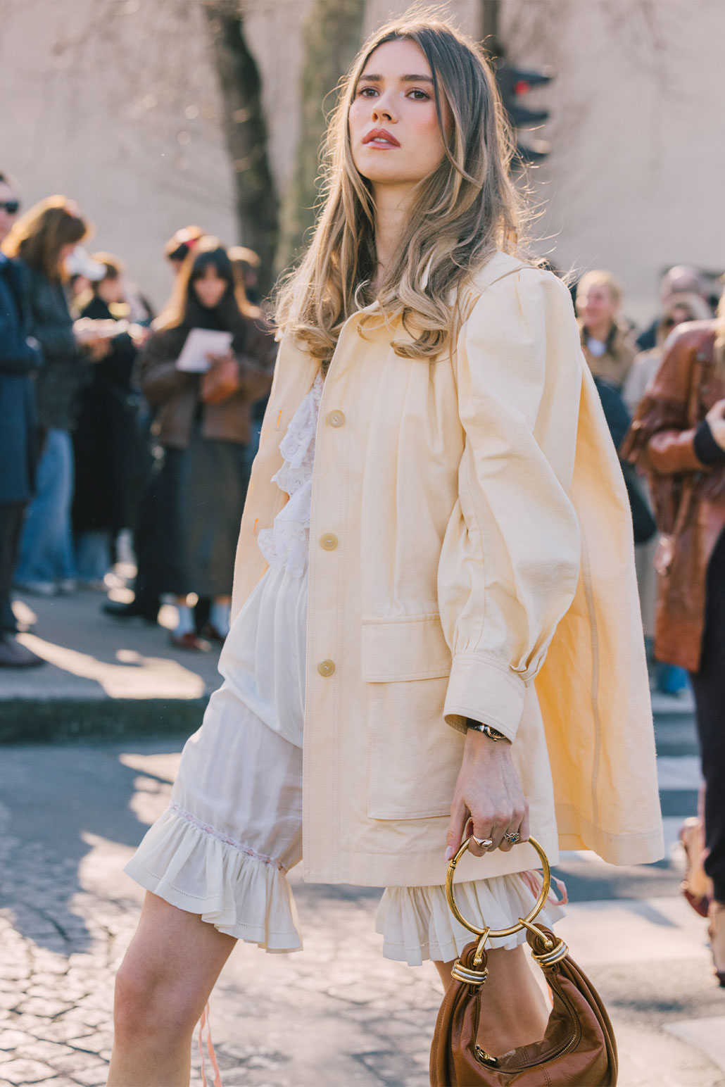 Model wears Chloé - Bracelet Bag Mini in Shiny Grained Calfskin