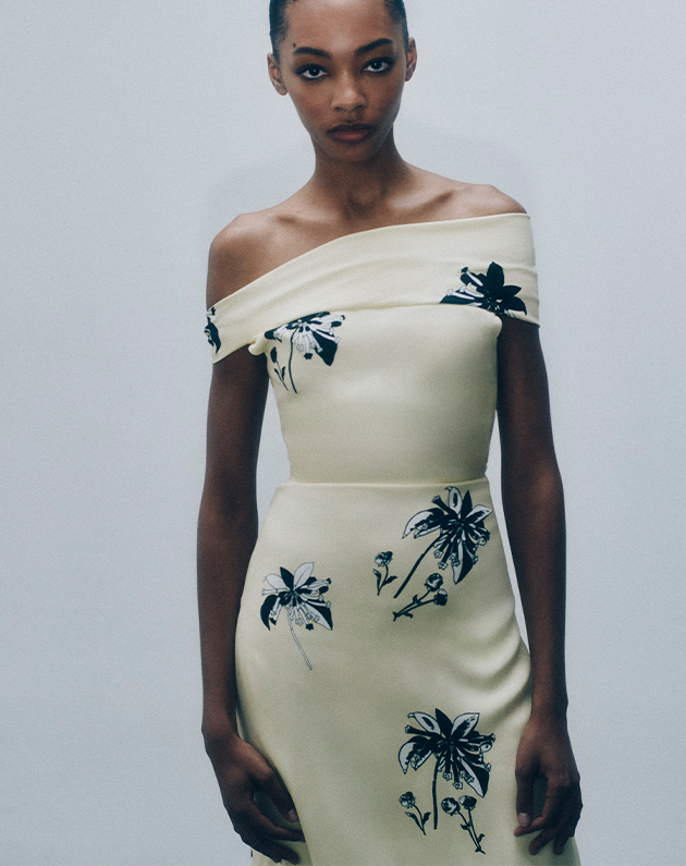 Model wears Prada - Off-The-Shoulder Floral-Print Belted Midi Dress