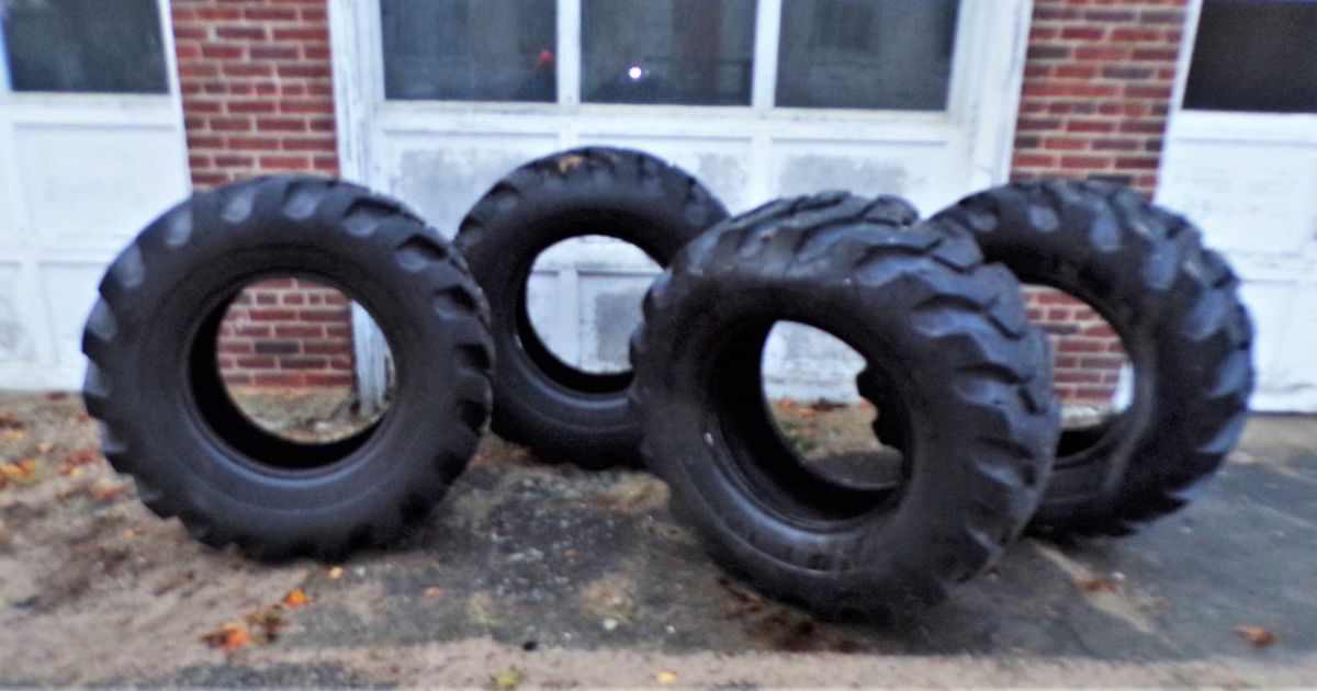 One Set of 4 Firestone 12 Ply Tubeless Front End Loader Tires Offsite