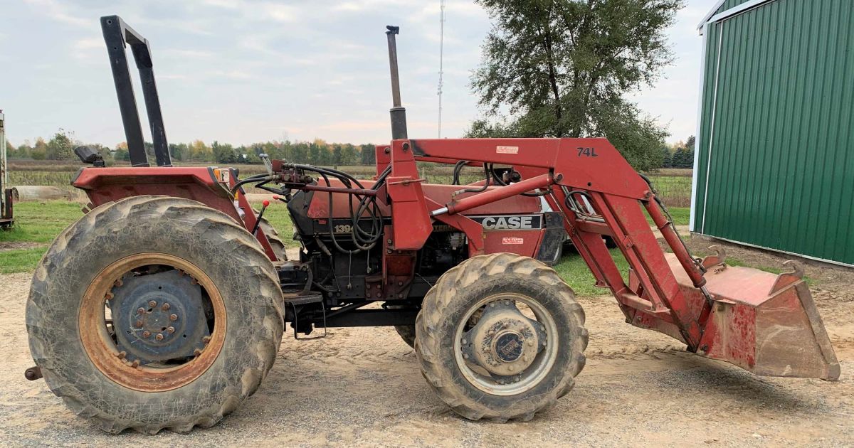 Case I.H. 1394 Tractor and 74L Loader with Pallet Forks, Offsite St