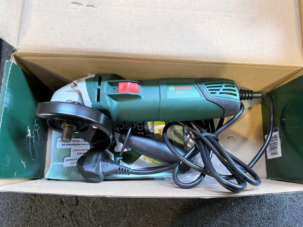 Unused Bosch Model Pws 700 115 115mm Angle Grinder On Auction