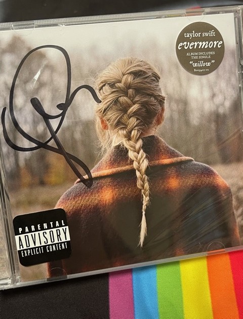 Taylor Swift signed Evermore CD | gtp | Bid Now - ☑ $30