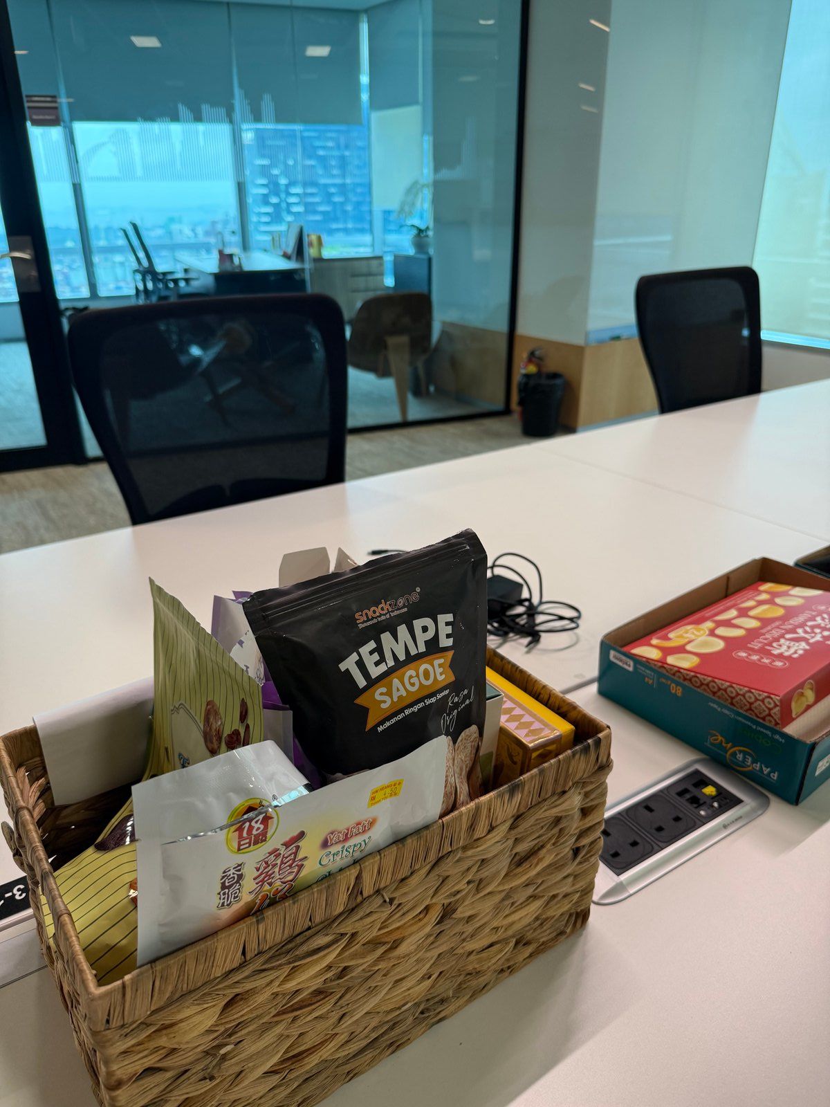 A bag of tempe chips on a desk at IBM Singapore