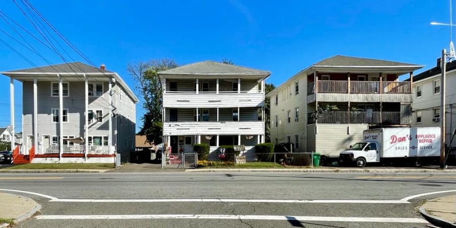 A photograph of three homes, chicopee.