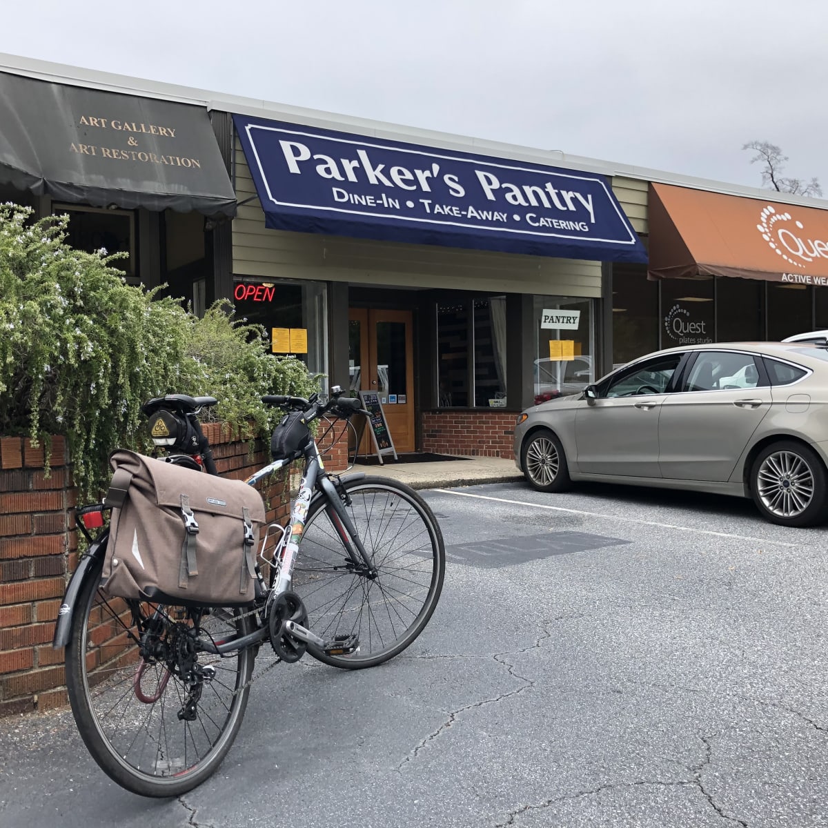 A photo of my bicycle in front of Parker's Pantry.