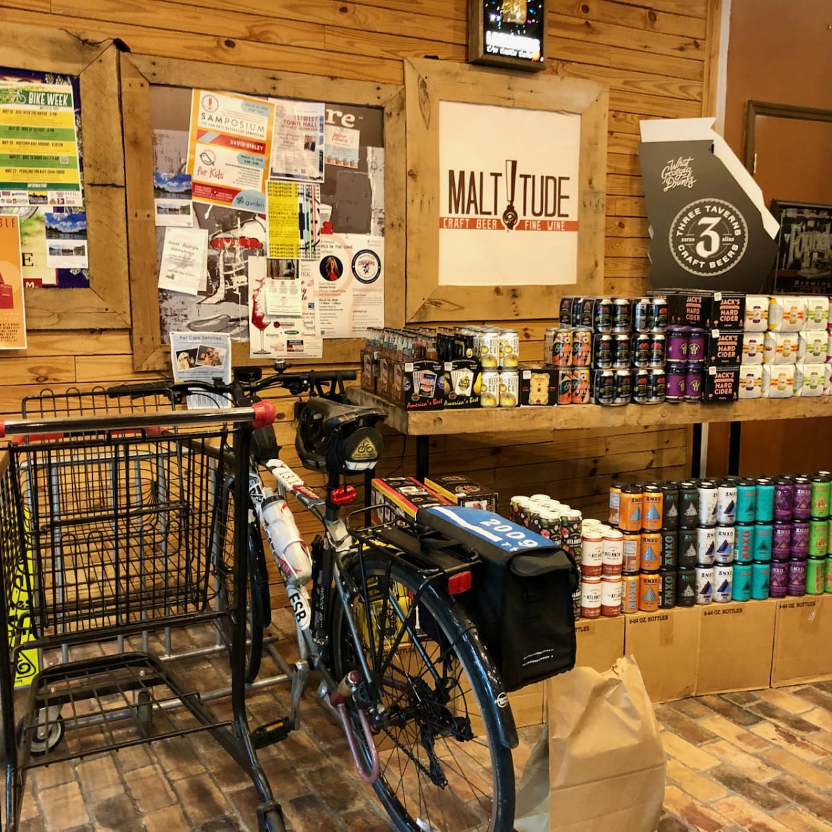 A photo of my bicycle parked inside the Maltitude store.