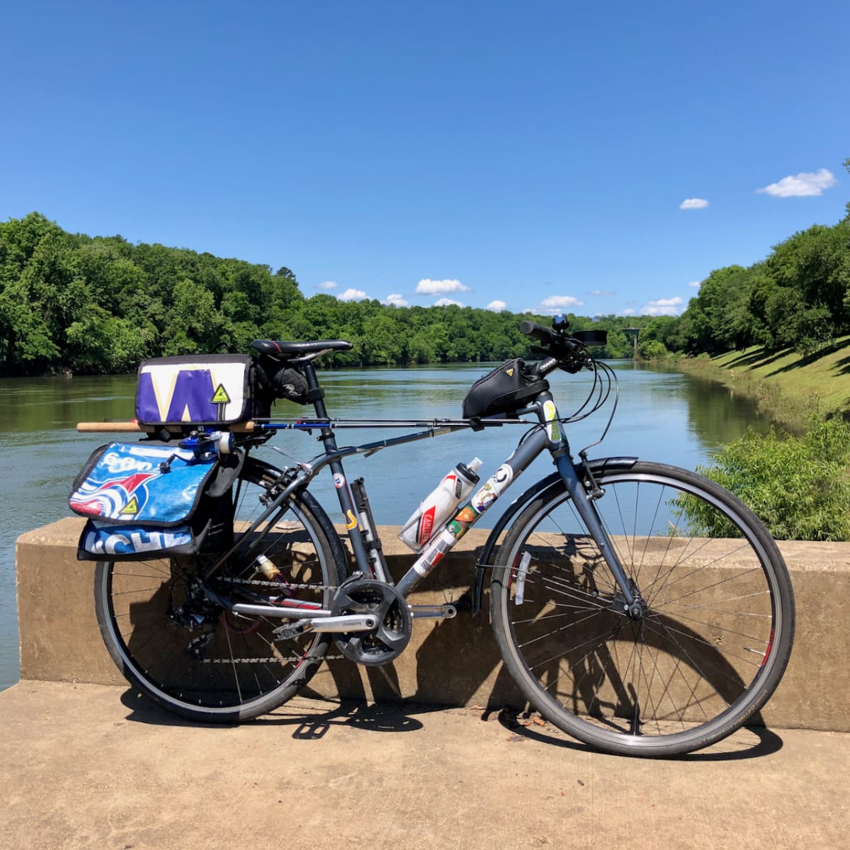 A photo of my bicycle carrying a fishing rod.