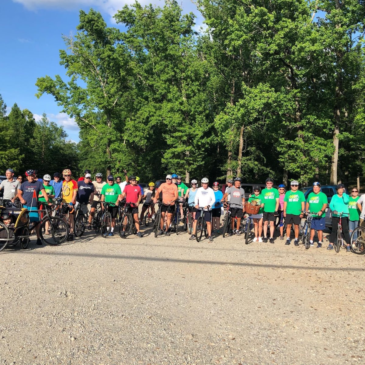 A group photo of bicycle riders.