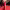 Vestido rojo de Alexandre Vauthier con abertura alta cover