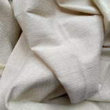 Mejores tejidos y materiales para la moda infantil sostenible y ecológica cover